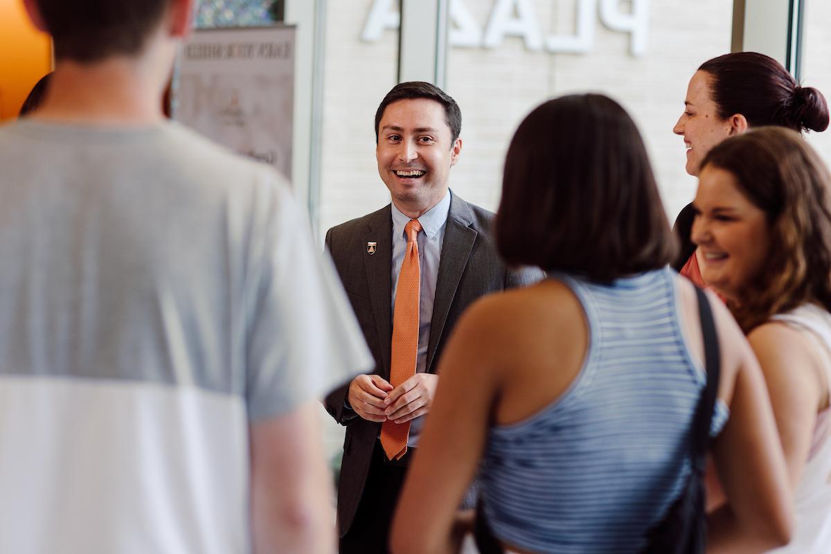 Students and Staff Interacting on Campus